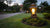 Japanese style outdoor lighting fixtures with photocell shown in a garden