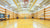 Basketball court lighting illuminating an inside basketball court