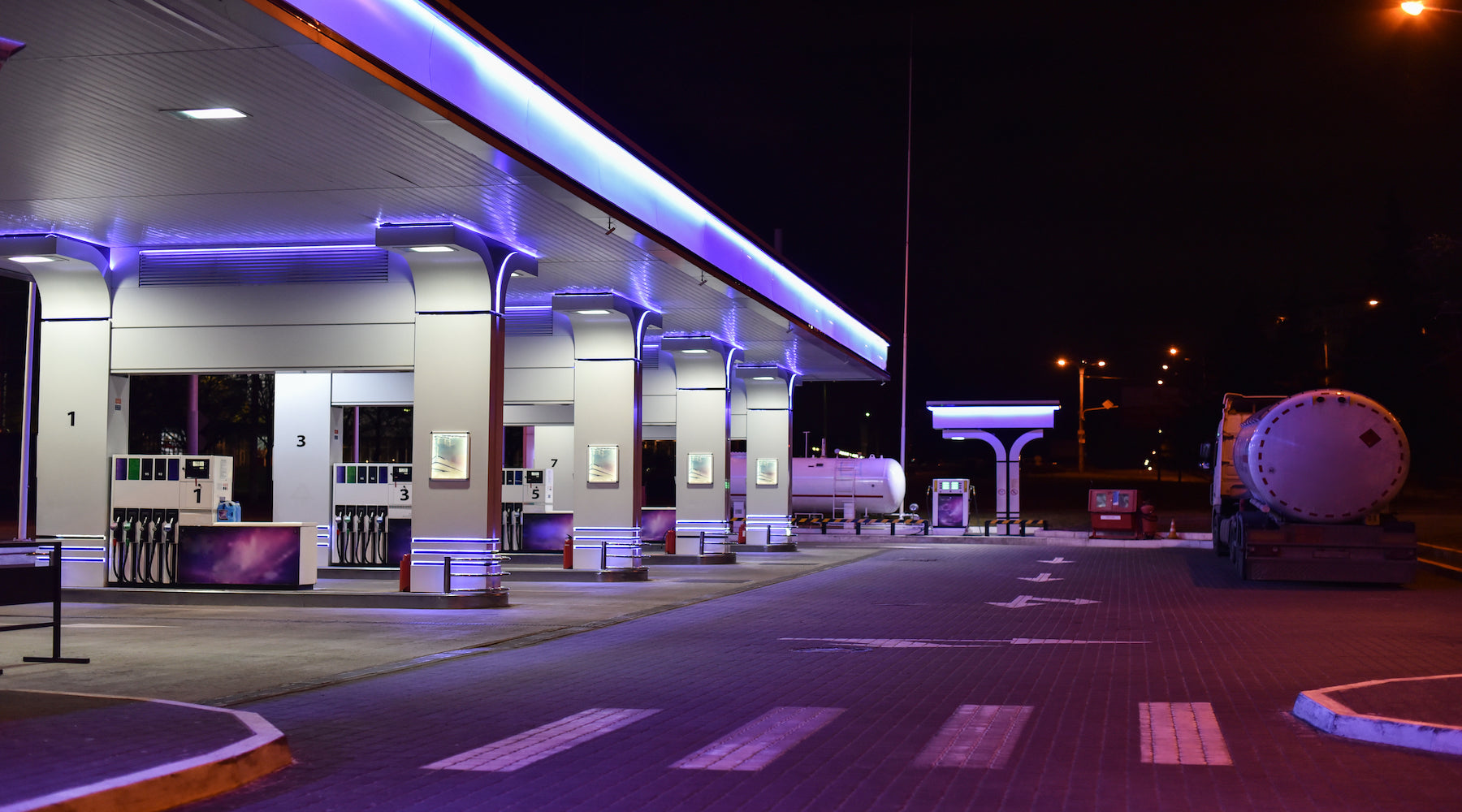 Canopy lights installed in a gas station canopy