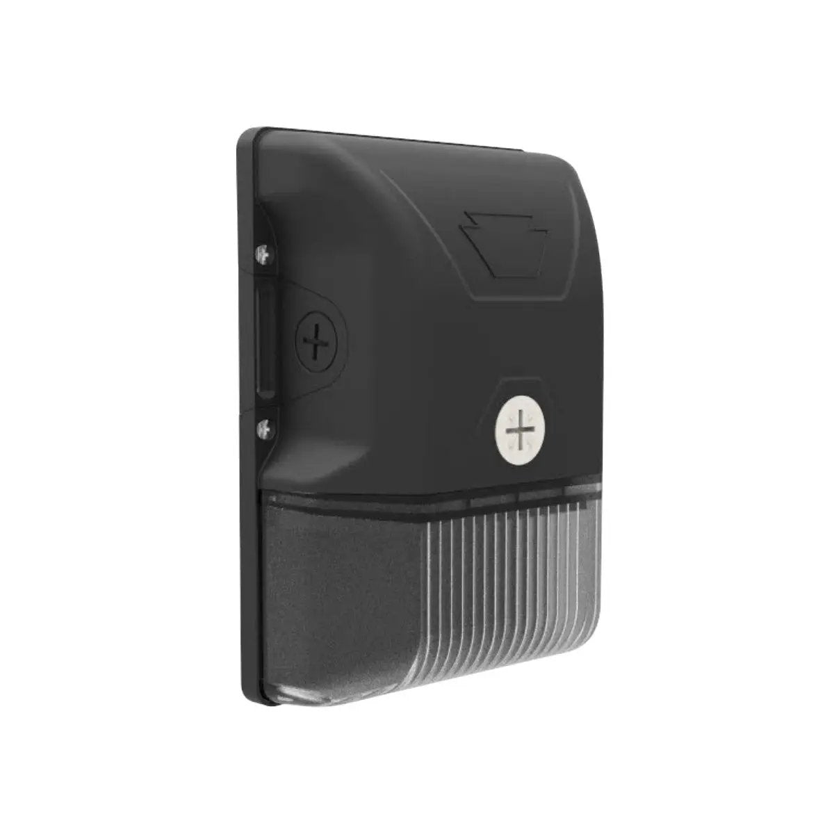 LED Mini Wall Pack - A compact black and clear object with a cross, ideal for safety and security illumination. Provides 2700 lumens of CCT selectable white light with a diffused polycarbonate lens. Features built-in dusk-to-dawn photocell and color select technology. Keystone Technologies, 20W, 120-277V, 5.81"W x 3.09"D x 8.61"H.