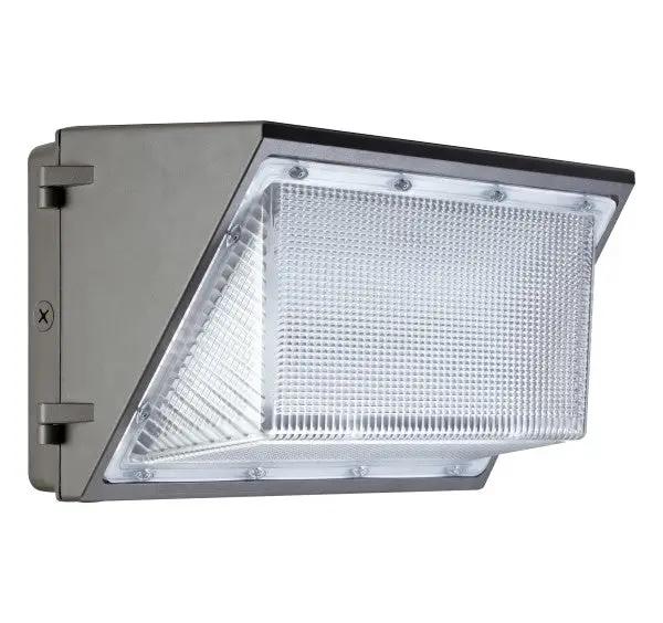 A close-up of a silver LED Wall Pack by SLG Lighting, providing 11200 lumens of light output for general purpose area and security lighting. Efficient and energy-saving, it consumes less energy than traditional wall mount technologies. UL Listed, FCC Compliant, RoHS Compliant, IP65 Rated, and DLC Standard Listed. Dimensions: 18"W x 8.72"D x 9.83"H. 10-year warranty.