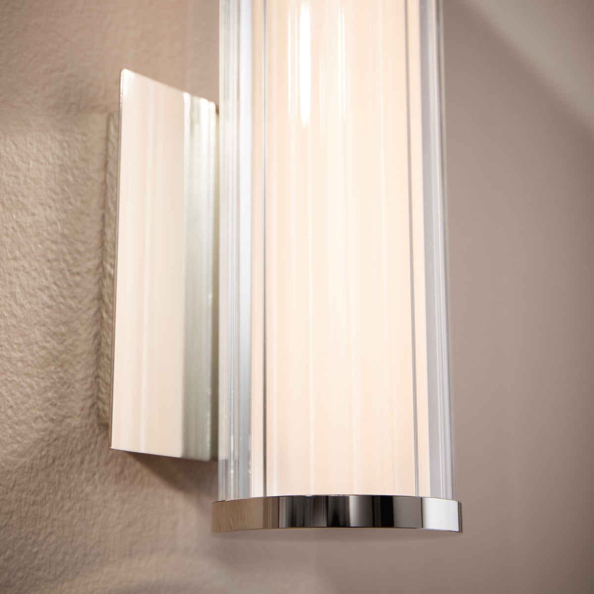 LED Wall Sconce with clean lines and subtle sophistication. Perfect for modern applications. Suitable for any residential space. 9 Watts, 120V input voltage, 689 lumens, 3000K color temperature, dimmable. UL Listed. Damp Location safety rated. 2-year warranty.