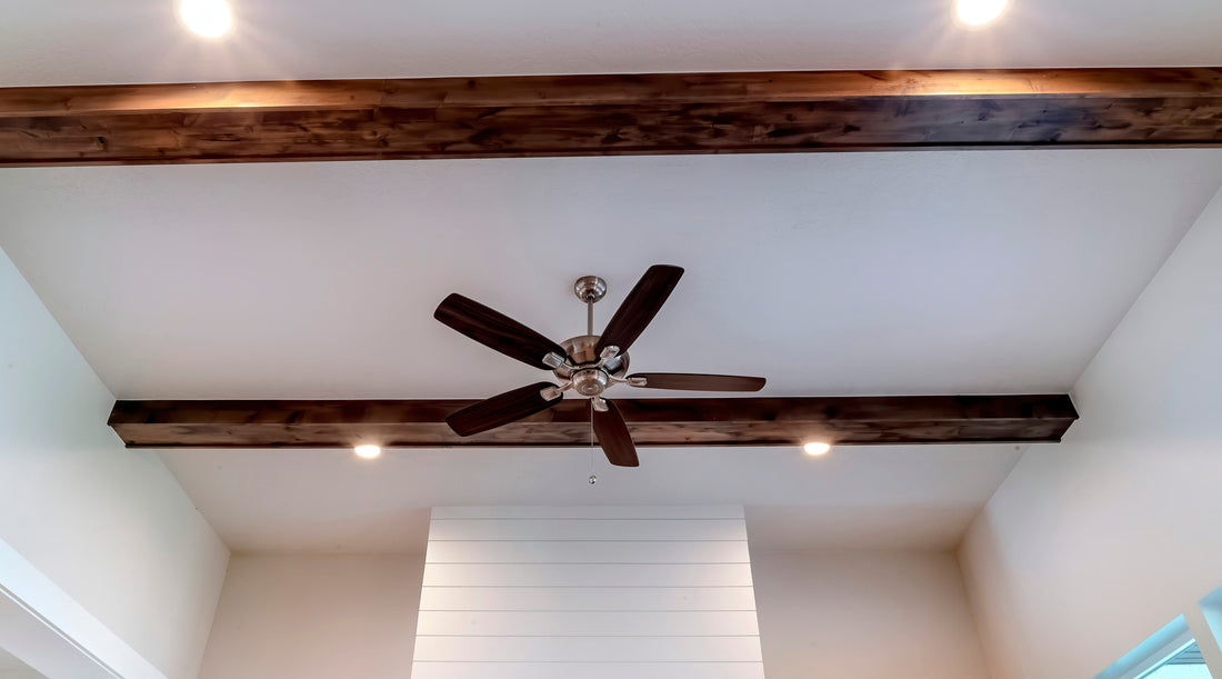 BR30 LED bulbs used in recessed ceiling lights in living room with wooden beams