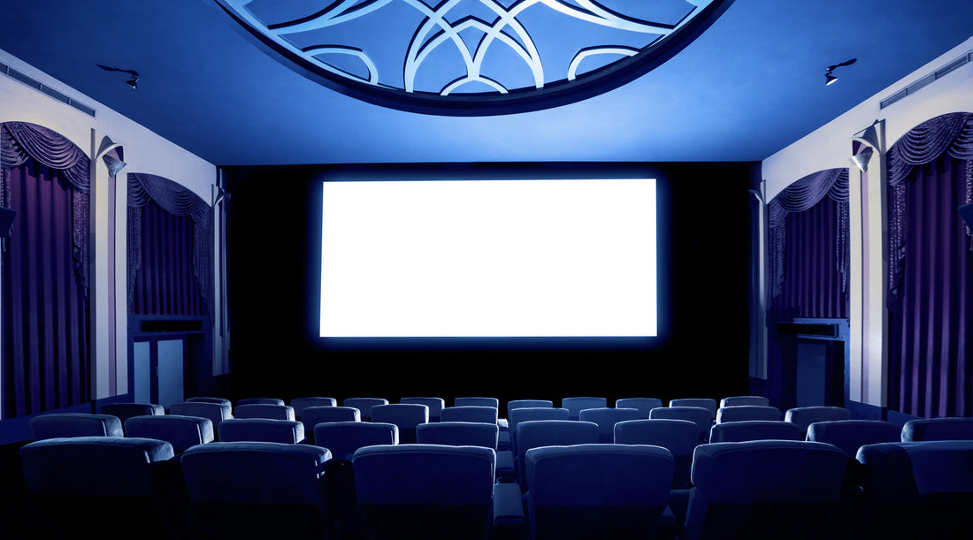 Cinema theater showing empty white screen