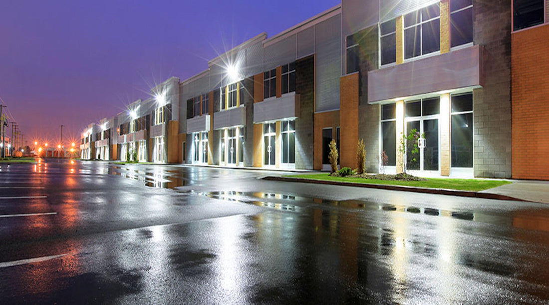 Commercial building exterior shown with LED flood lights