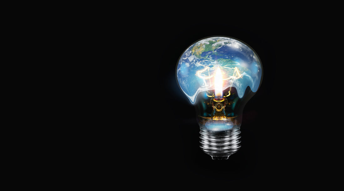 LED light bulb with world inside and global warming isolated on black