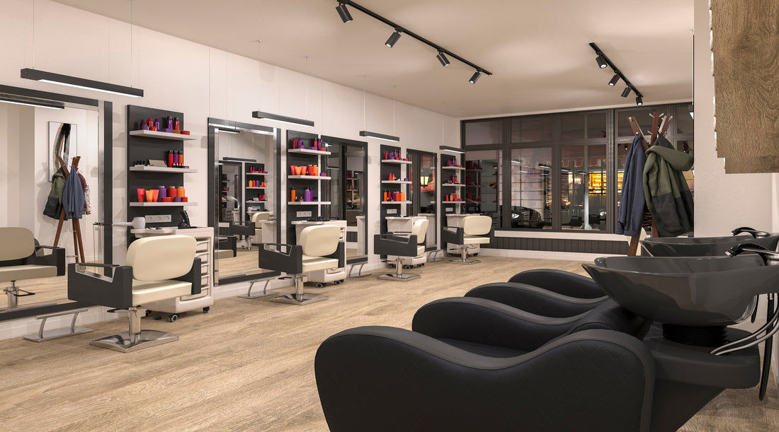Linear pendant lights and track lighting used in modern hair salon commercial setting
