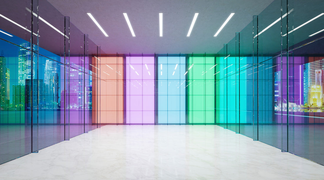 Lobby waiting space with linear LED lights and modern colored glass walls