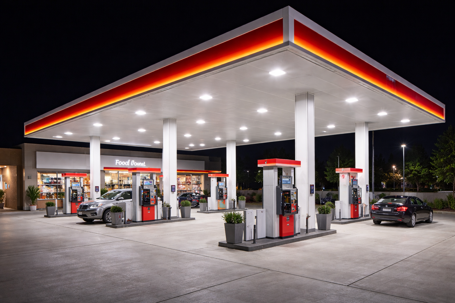 LED gas station and canopy lighting illuminating a modern commercial fuel station with uniform light across the forecourt and pump areas