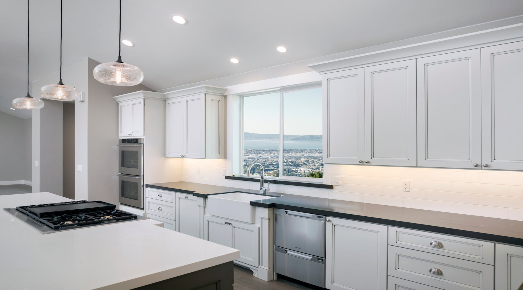 Recessed lighting installed in contemporary style kitchen