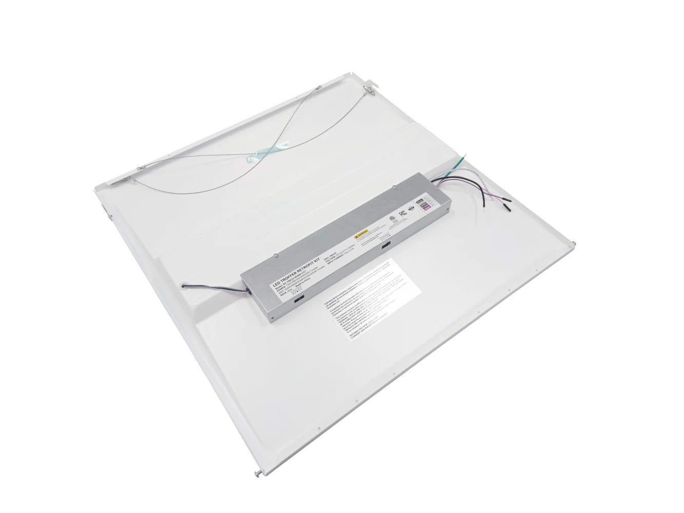 Back view of the 2x2 LED troffer retrofit kit showing the driver box with CCT and wattage selectable slide switches on the side and the included safety cable; 0–10V dimming, 120–277V.
