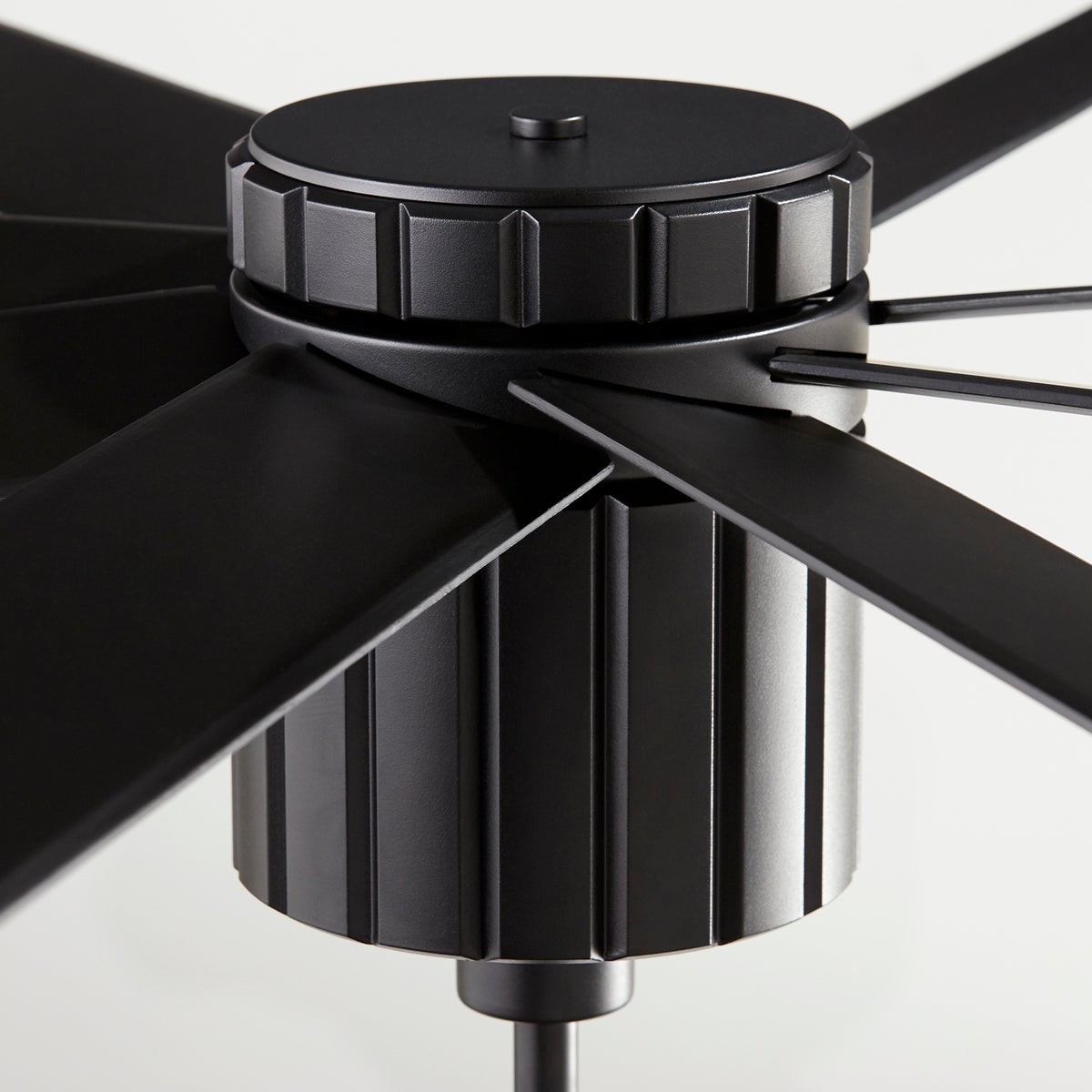 A sleek, sophisticated 72 inch ceiling fan with upturned blades for maximum air circulation. Its cylindrical housing adds contemporary artistry to its beauty.