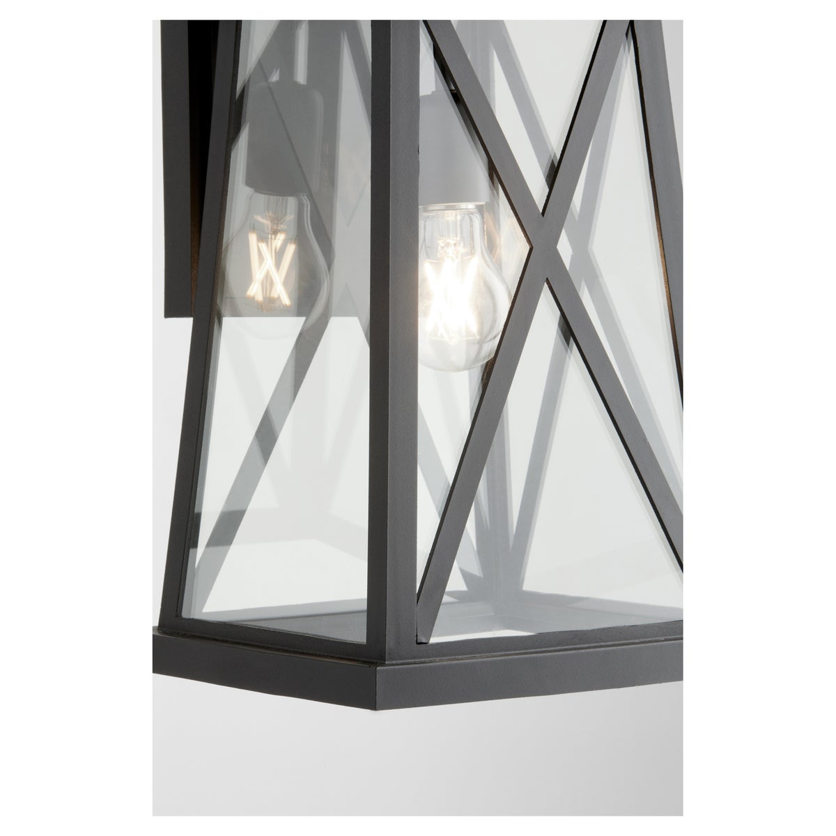 Black Outdoor Wall Light with X-Brace Design, casting warm glow, enhancing outdoor elegance. UL Listed for wet locations. 100W, Medium E26 base.