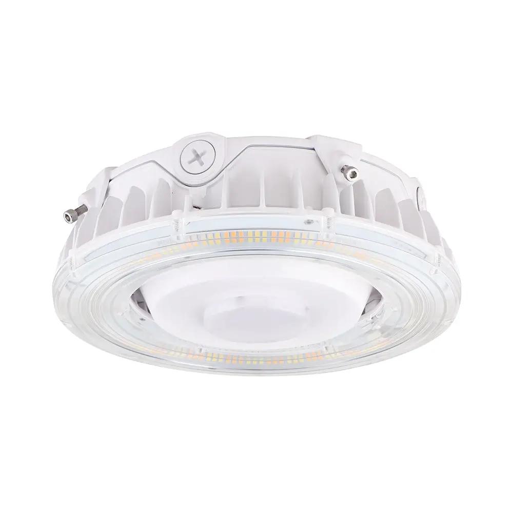 LED canopy light with sealed IP65 housing for covered exterior applications; 100–277V input, 0–10V dimming, 55W output (6,975–7,700 lumens) with selectable 3500K/4000K/5000K and 80+ CRI.