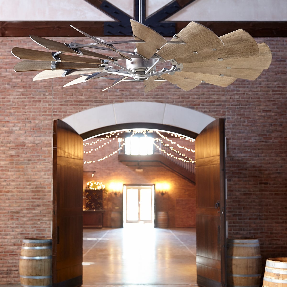 Alt text: "Farmhouse Ceiling Fan with 15 weathered oak wooden blades, rustic design, and a windmill-inspired look. Quorum International DC-165L motor, UL Listed, dry location. Dimensions: 16.5"H x 72"W."