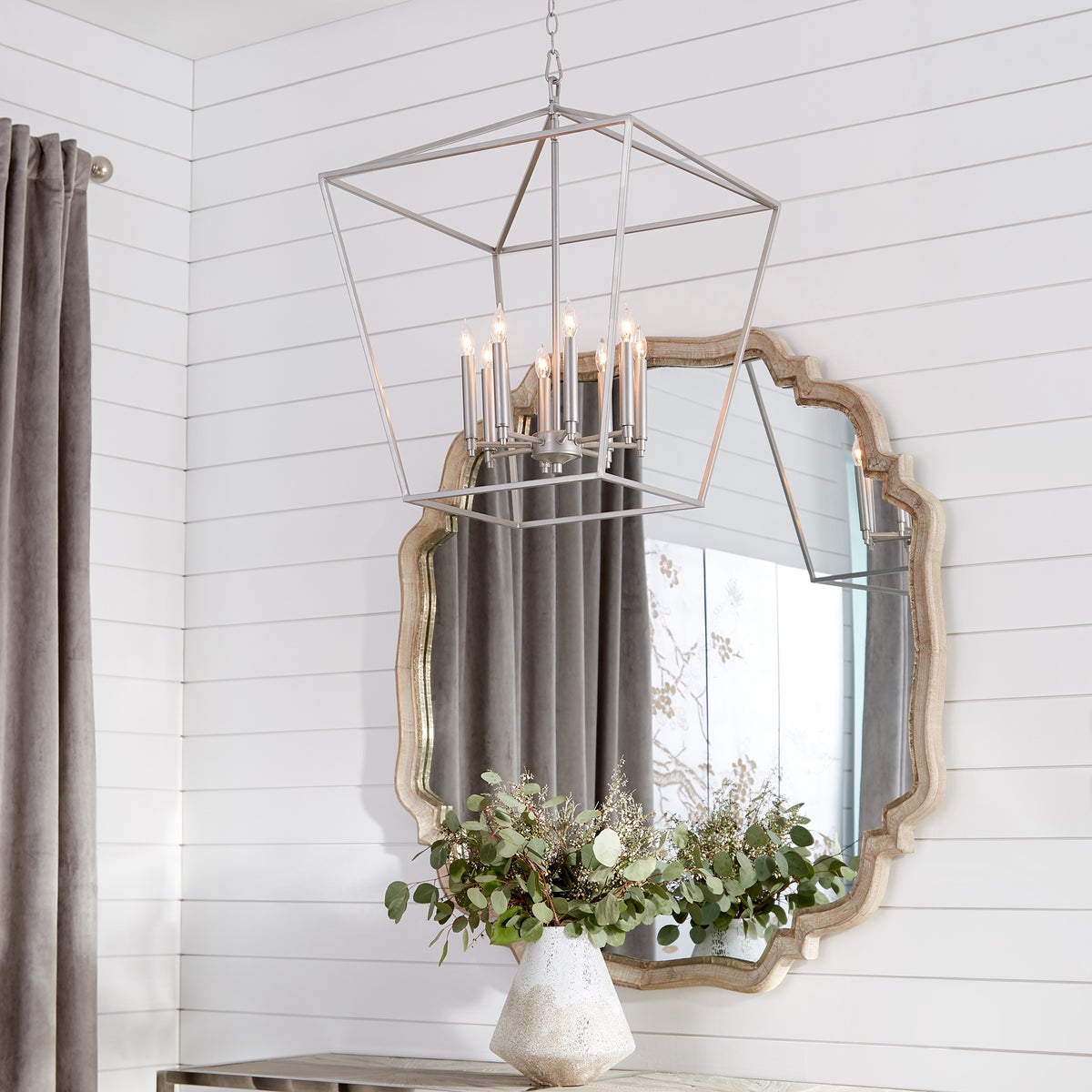 Farmhouse chandelier with open tapered shade, perfect for foyer, hallway, or kitchen. Fits candelabra bulbs for ample illumination. Dimensions: 22"W x 26.25"H.
