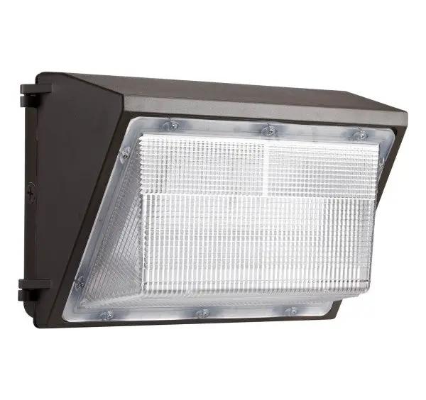 A close-up of an LED Wall Pack Lighting Fixture by SLG Lighting, providing 8100 lumens of light output for general purpose area and security lighting. It is energy-efficient and has a dark bronze finish.