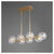 Linear Sputnik Chandelier with clear glass balls, aged brass frames, and mid-century modern appeal. Dramatic and charming lighting fixture for any environment. Wow your guests with this brilliant design.