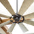 Modern Ceiling Fan with 8 wood blades, perfect for mid-sized and larger spaces. Damp listed for outdoor covered areas. Elevate your space with this Quorum International fan.