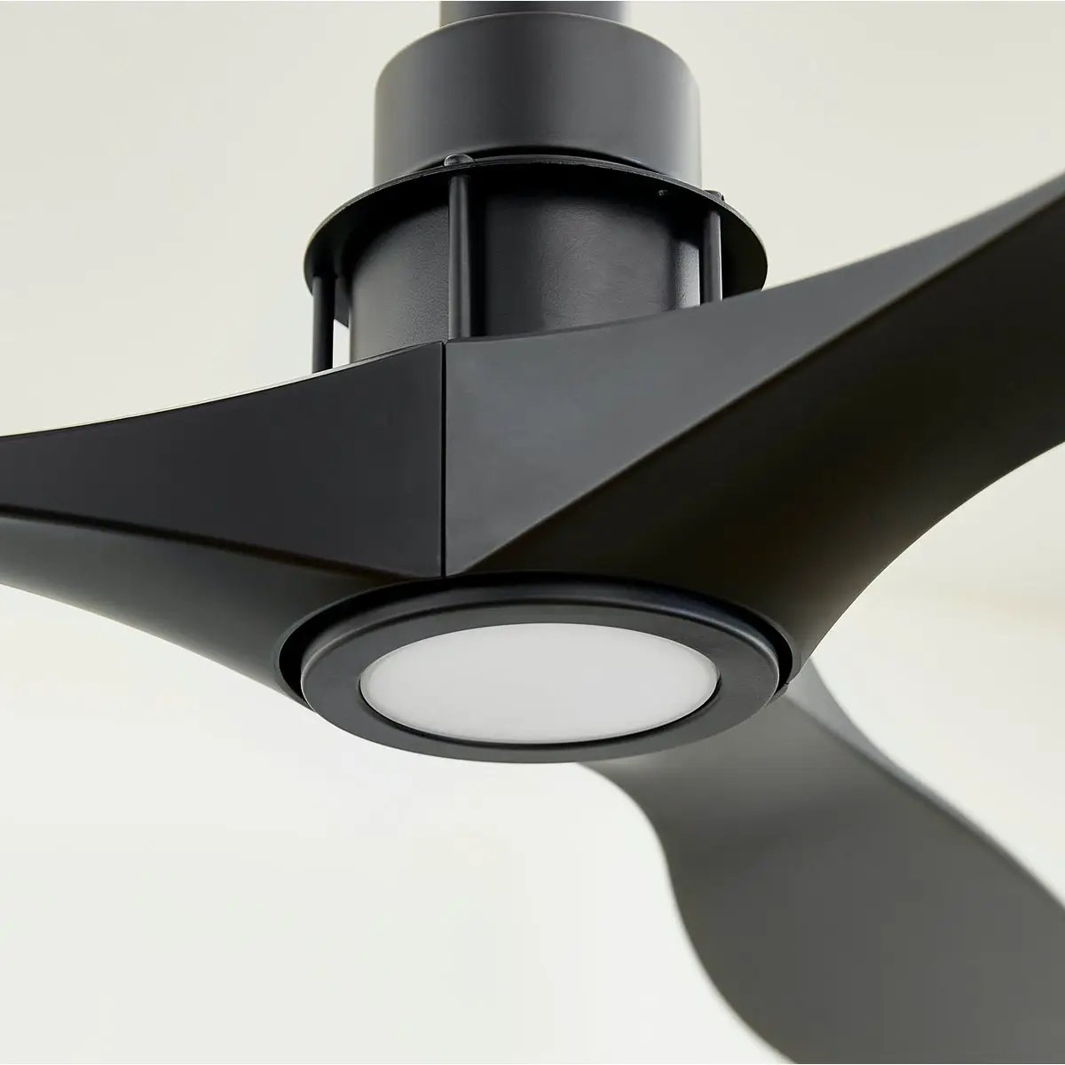 A sleek and modern ceiling fan with a light kit, featuring a chrome stained housing and three monochromatic blades. Provides powerful and long-lasting air circulation. Perfect for any interior space.
