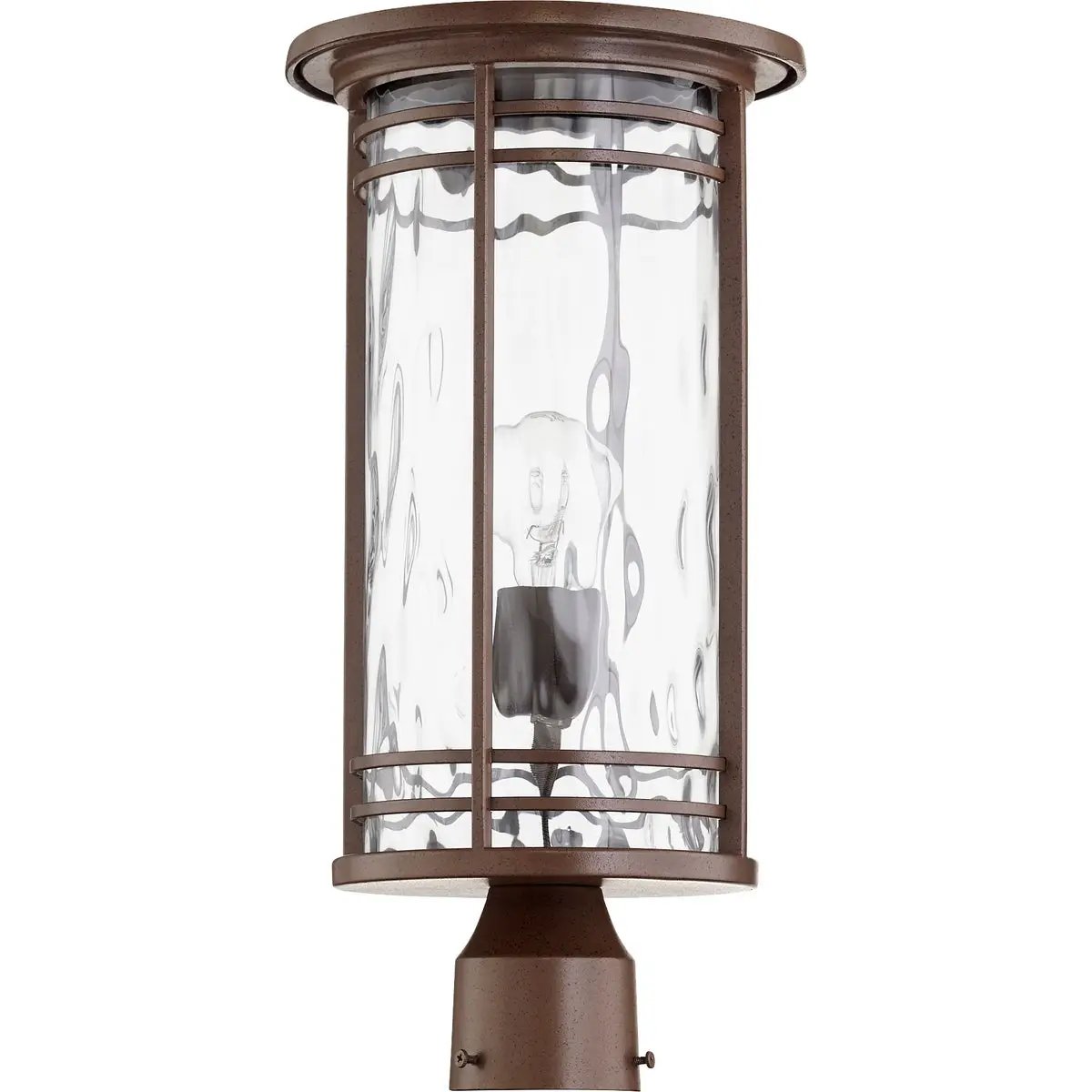 Modern Outdoor Post Light with clear glass shade, clean-lined silhouette, and oiled bronze finish. Casts a beautiful glow for both form and function. Brand: Quorum International. Wattage: 100W. Input Voltage: 120V. Bulbs: 1 (not included). Bulb Base Type: Medium E26. Dimmable. Certifications: UL Listed. Safety Rating: Wet Location. Dimensions: 9.25&quot;W x 18.75&quot;H. Warranty: 2 Years.