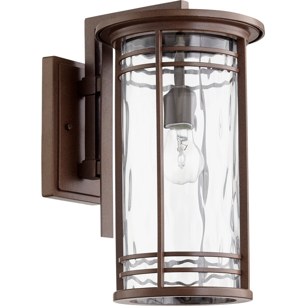 Modern Outdoor Wall Light with clear glass cylinder shade, oiled bronze finish. Clean-lined elongated drum silhouette. UL Listed, Wet Location. 9.25"W x 16.25"H x 12.25"E. 100W, 120V, Medium E26 base. Dimmable. 2-year warranty. Stars and Stripes Lighting.