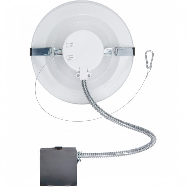 A white round object with a metal hose attached to it, ideal for drop ceiling lighting. CCT selectable and lumen adjustable with 0-10V dimming. Provides 1800 to 3000 lumens of strong and smooth multi-cct white light.
