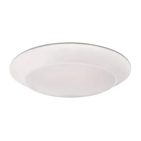 A Lotus LED Lights recessed mount ceiling light fixture, providing 900 lumens of 3000K white light. Energy-efficient, dimmable, and wet location rated for soffits and showers. 7.38"D x 1"H. 5-year warranty.