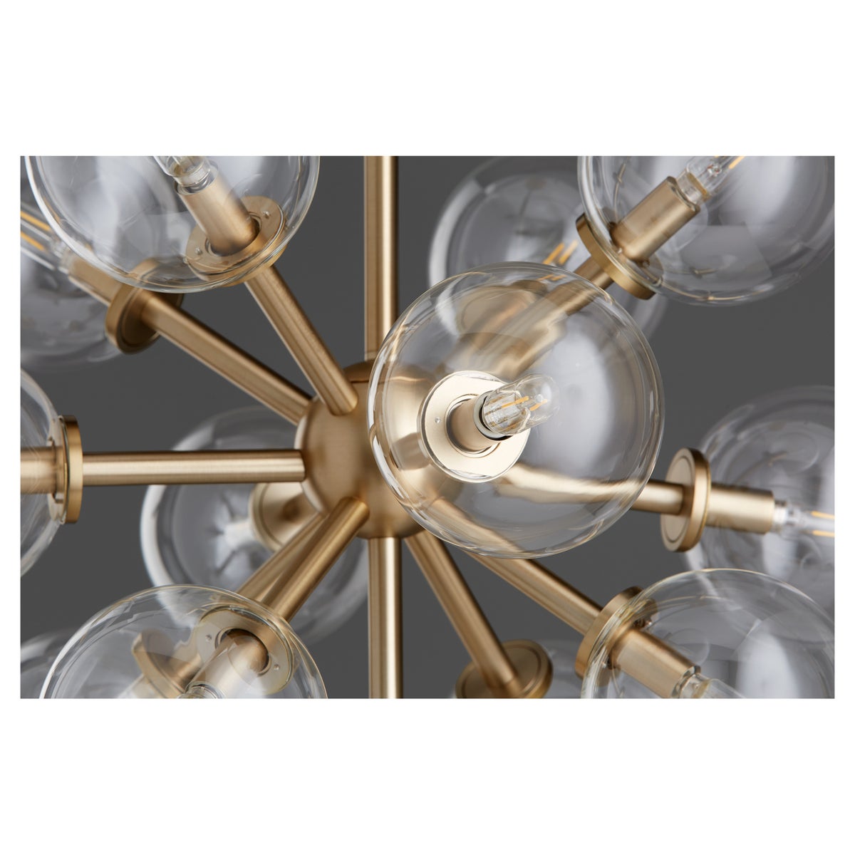 Sputnik chandelier with clear glass domes and aged brass frames, creating a mid-century modern appeal. 13 bulbs, 60W, dimmable. UL Listed.