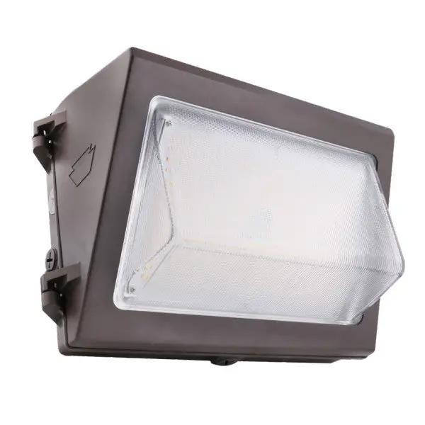 A close-up of a Traditional Wall Pack LED light by Keystone Technologies, providing 7690 lumens of CCT selectable white light. Dimmable and equipped with a built-in dusk-to-dawn photocell. Color temperature can be easily selected. Perfect for energy-efficient lighting upgrades.