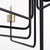 Transitional chandelier with clear glass bulbs and tubes, featuring a linear frame and soft-angular curves. Two-toned aged brass and noir finish. Suitable for indoor and outdoor spaces. Adjustable chain/stem hung suspension system. 34.5"W x 33.5"H. Quorum International.