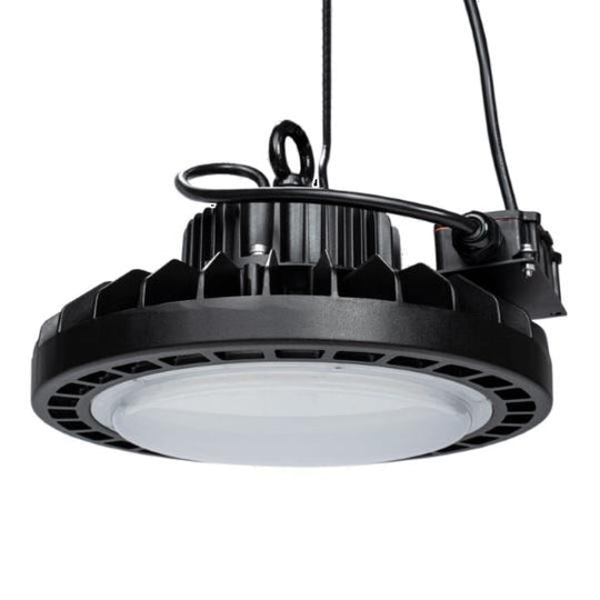 A black UFO High Bay Light fixture with a round LED light, providing 13000 lumens of 5000K white light. Energy-efficient and easy to install, this compact luminaire replaces HID fixtures, ensuring even lighting throughout the space. Perfect for commercial and residential use.