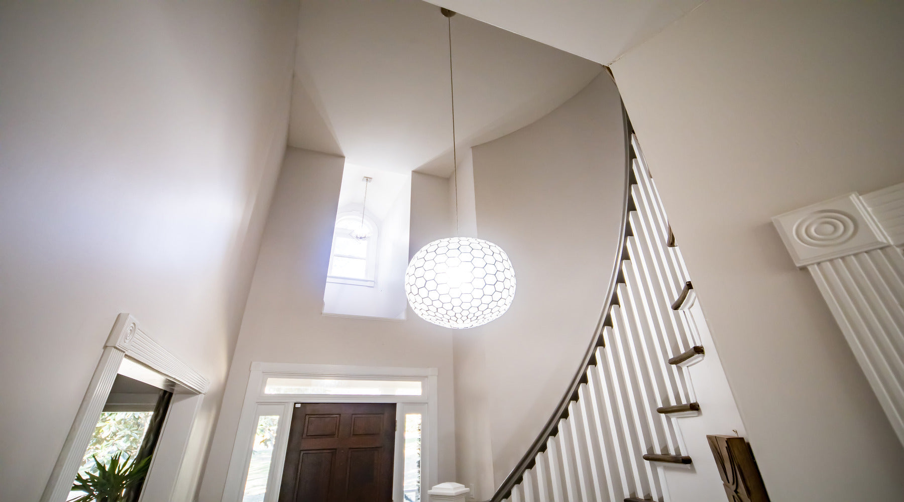 A19 LED bulb used in pendant light hanging in entrance of newly renovated house