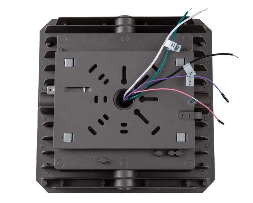 Rear view of CanoLux Series LED canopy light showing mounting plate interface and factory power wiring for commercial installation