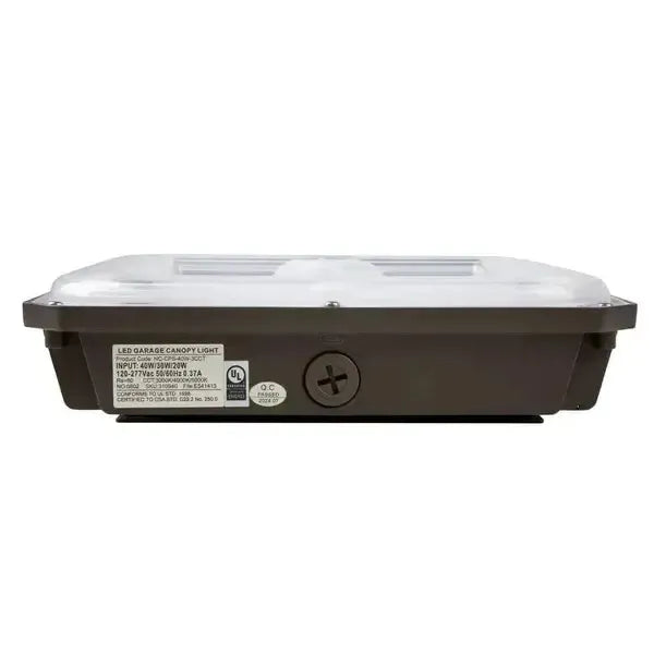 Upside down side view of CanoLux Series LED canopy light showing electrical knockout access point for conduit installation