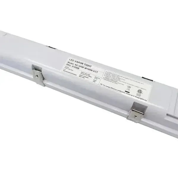 Rear close-up of StormGuard Series vapor tight light showing stainless steel locking clips securing gasketed lens housing